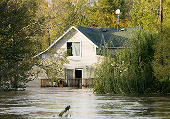 House with floodwaters reaching the 2nd floor