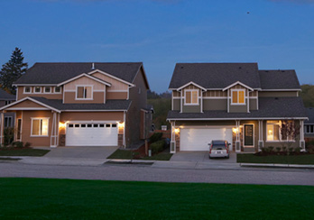 Grounded plug resting on a stack of money