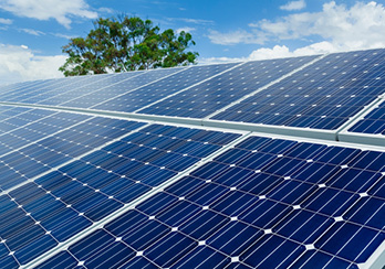 Metal power tower superimposed on a pile of $20 bills