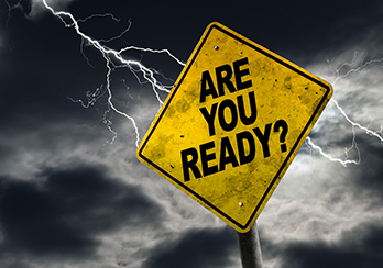 "Are You Ready" sign & stormy skies