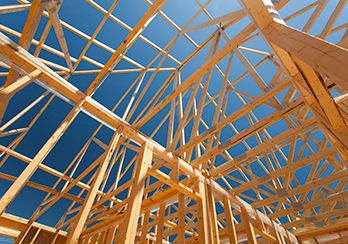 Wooden beams against a blue sky