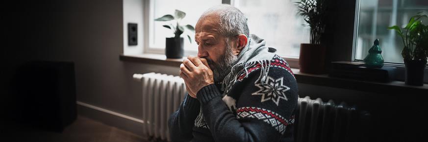 senior man staying warm