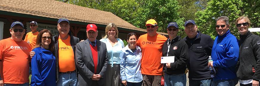 Group of PSEG LI personnel standing together outside