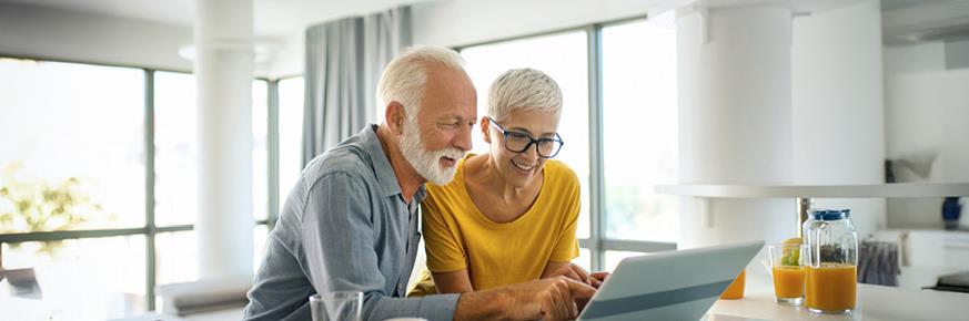 Hands holding blocks that spell out 