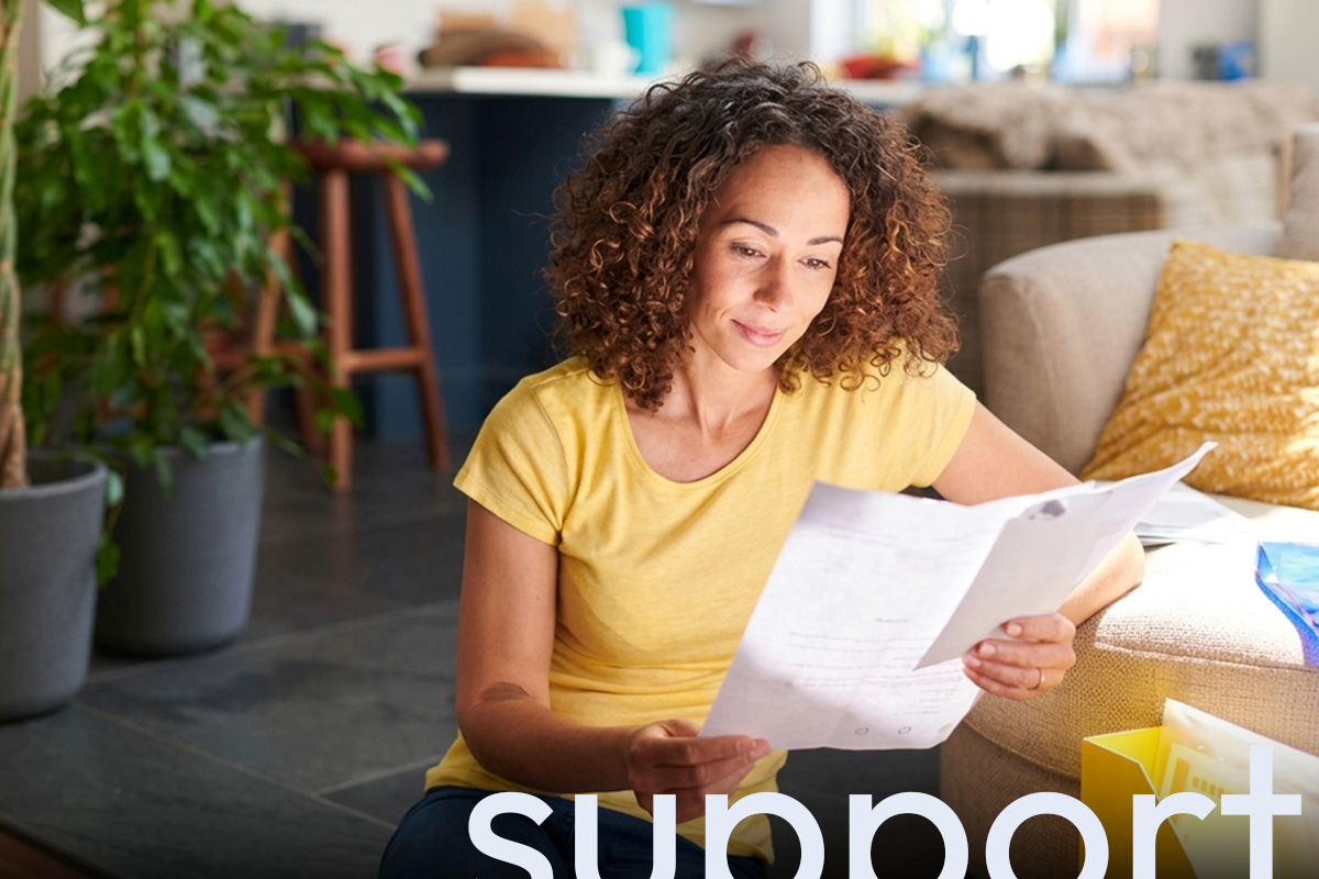 Woman looking at energy bills