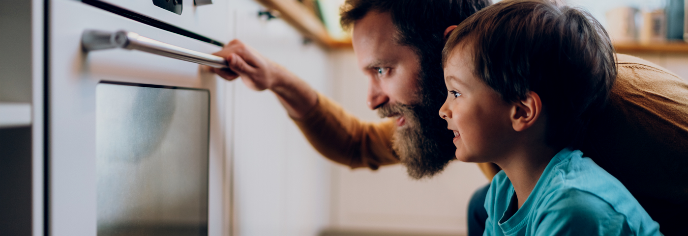 Dad and son with stove