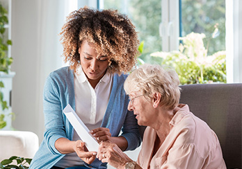 Women looking at paperwork