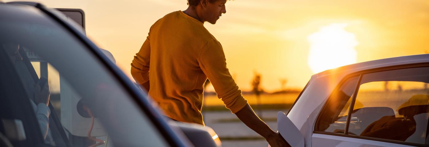 Man charging EV