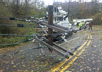 Downed utility pole in the street