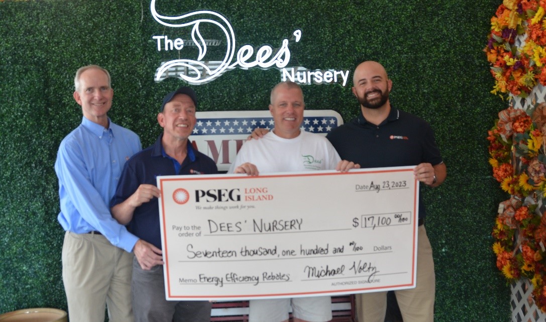 Pictured from left to right are: Michael Voltz and Steve Veccia of PSEG Long Island, Joseph DiDominica of Dees’ Nursery and Andrew Cacioppo, also of PSEG Long Island.