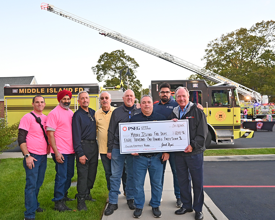 Pictured from left to right are Matthew Gropper, Raj Singh, Frank Smimmo, Walter Olszewski, Craig Tunjian and Nick Paglia of the Middle Island Volunteer Fire Department with Felix Ramos and Walter Hoefer representing PSEG Long Island’s Energy Efficiency team.
