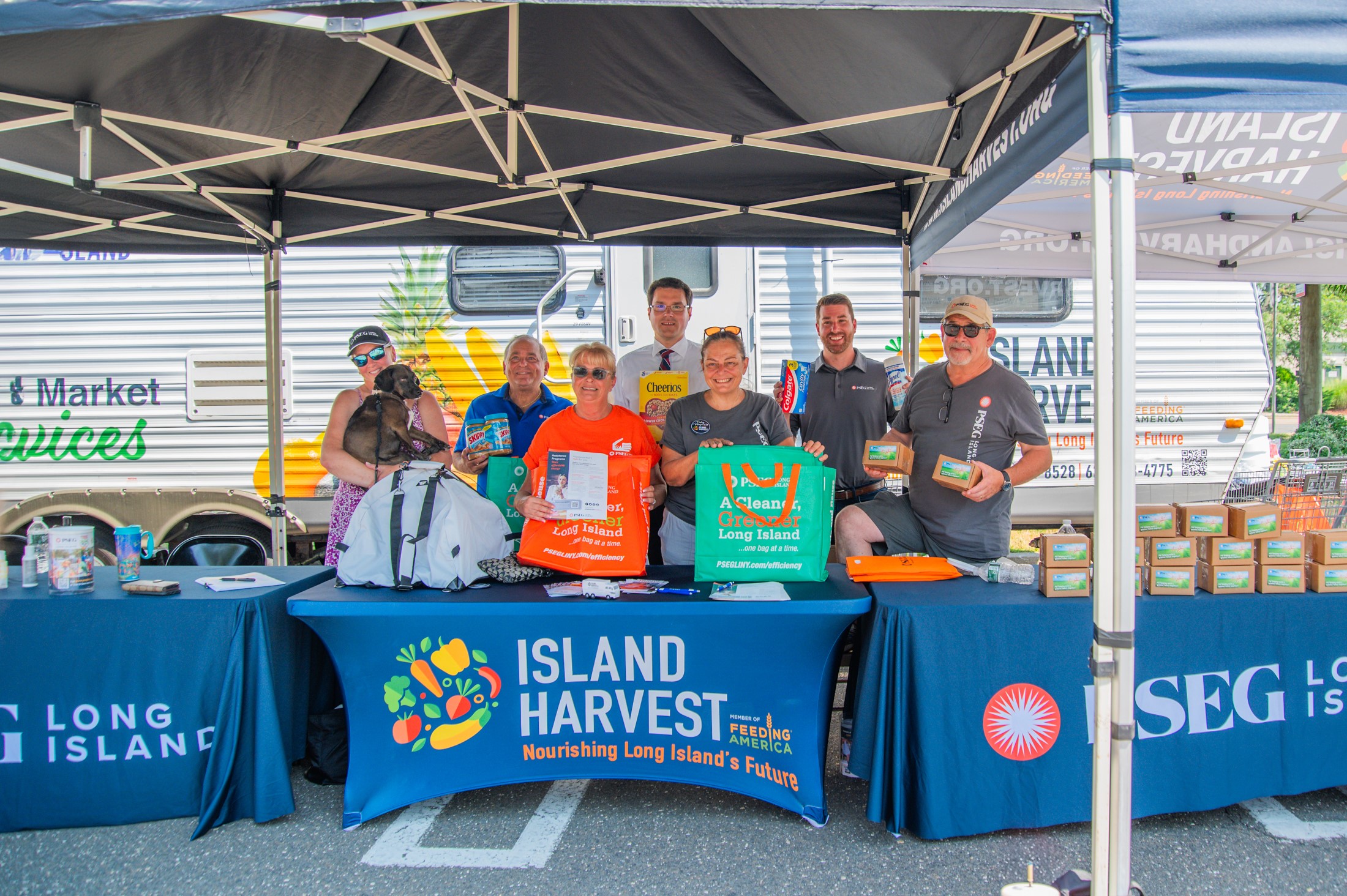 New York State Assemblyman John Mikulin (center) joined PSEG Long Island employee-volunteers collecting food, personal care items and monetary donations as part of PSEG Long Island’s Power to Feed Long Island collection initiative in Levittown on Friday, June 21. 
