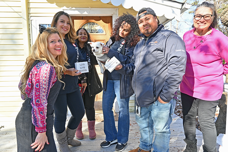 Pictured (far left and far right) Kathleen Hendel and Maria DiDio of Ready for Rescue with Mariela Espinosa, Gracia DeSilva, Johanna Villamil (holding Greyson, a rescue dog) and Norberto Lopez Gutierrez of PSEG Long Island