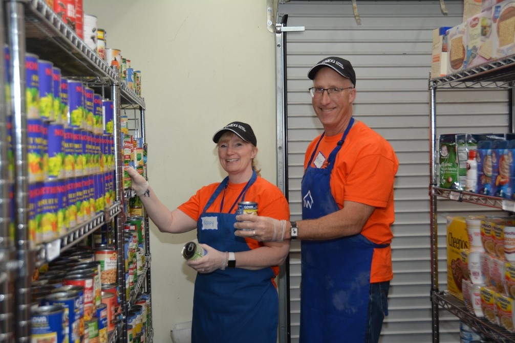 As part of PSEG Long Island’s commitment to the communities it serves, husband and wife team Kerry and Michael Cleary of Smithtown, who are both PSEG Long Island employees, and their co-workers recently pitched in at the INN’s Mary Brennan Soup Kitchen in Hempstead. The group helped stock the food pantry and prepare, serve and clean up meals for 400 people.
