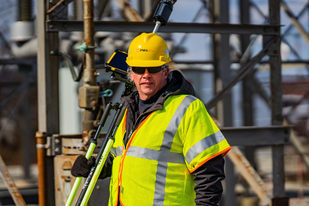 Surveyor Joseph Cattell is being recognized during Surveyors Week for 47 years of service with Long Island's electric utilities.
