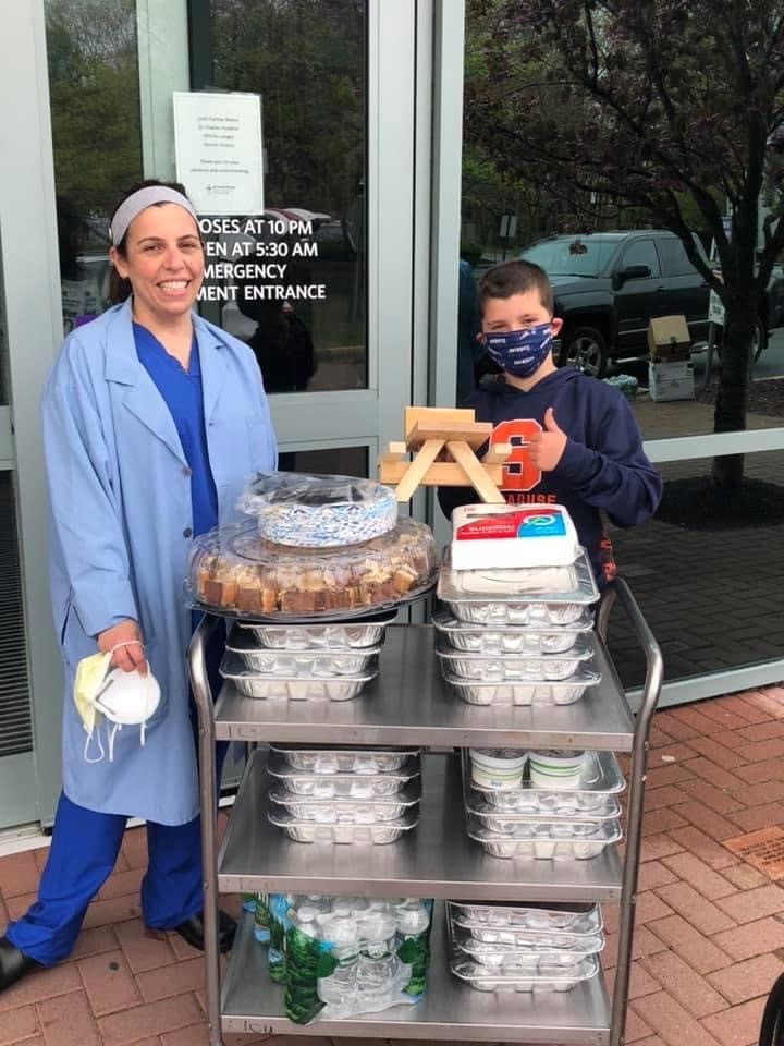 Brayden Lewis delivering a meal to his aunt at St. Charles Hospital in Port Jefferson for the front line workers in the intensive care unit, and the hospital’s emergency room staff.