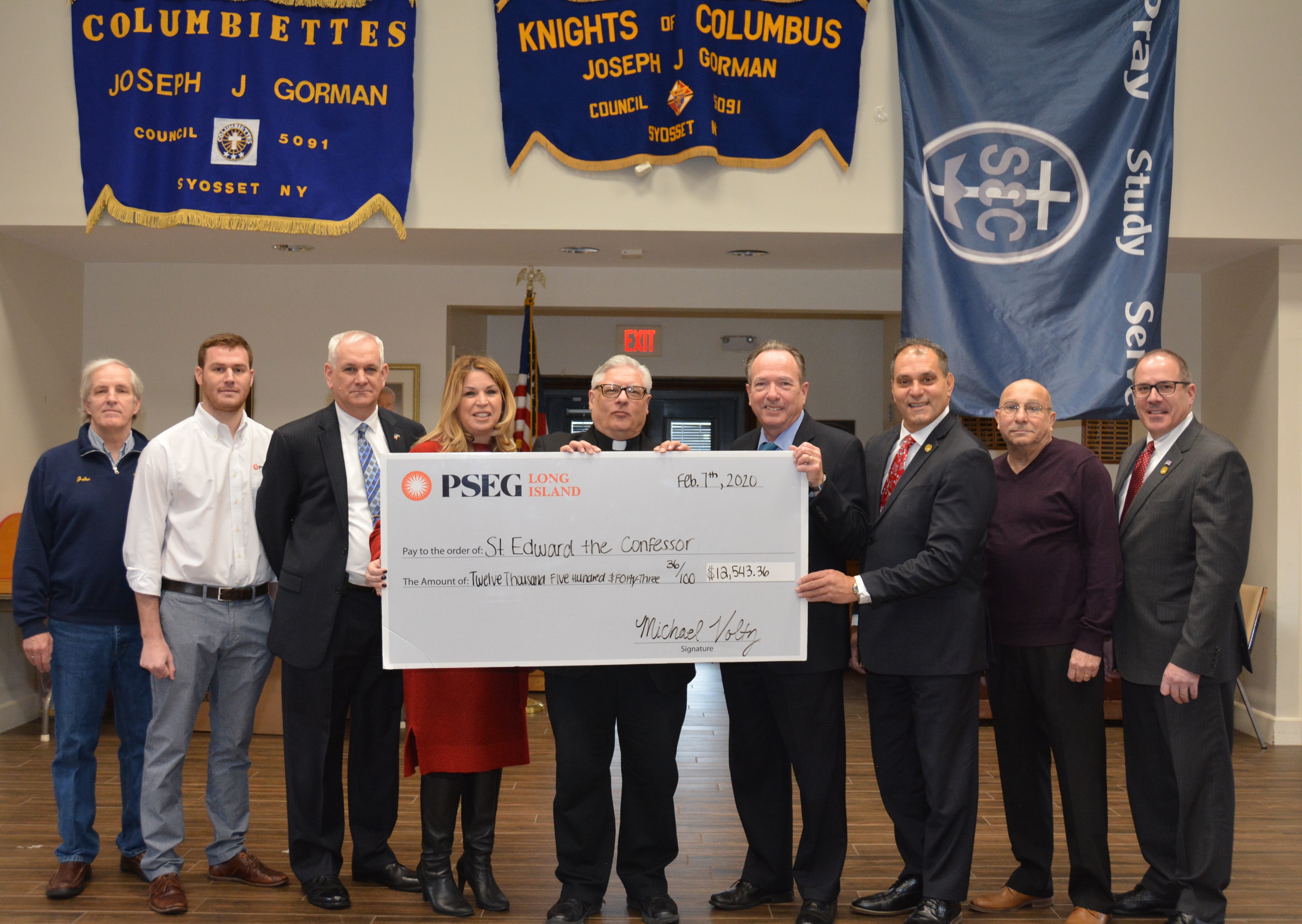 PSEG Long Island recently presented St. Edward the Confessor with a rebate check for more than $12,500 for making energy efficiency upgrades to the lighting inside and outside of its building. Pictured from left to right are: John O’Connor, Deputy Grand Knight , Knights of Columbus, Dillon Buchberg Energy Consultant, PSEG Long Island, Don MacAvoy, Chancellor of Knights of Columbus and parishioner at St. Edward the Confessor, Suzanne Brienza, Director of Customer Experience and Utility Marketing, PSEG Long Island, Father Mike Maffeo, Pastor, St. Edward the Confessor, Walter Hoefer, Contract Manager, PSEG Long Island, Joseph Saladino Supervisor, Town of Oyster Bay, and Richard LaMarca, Oyster Bay Town Clerk.