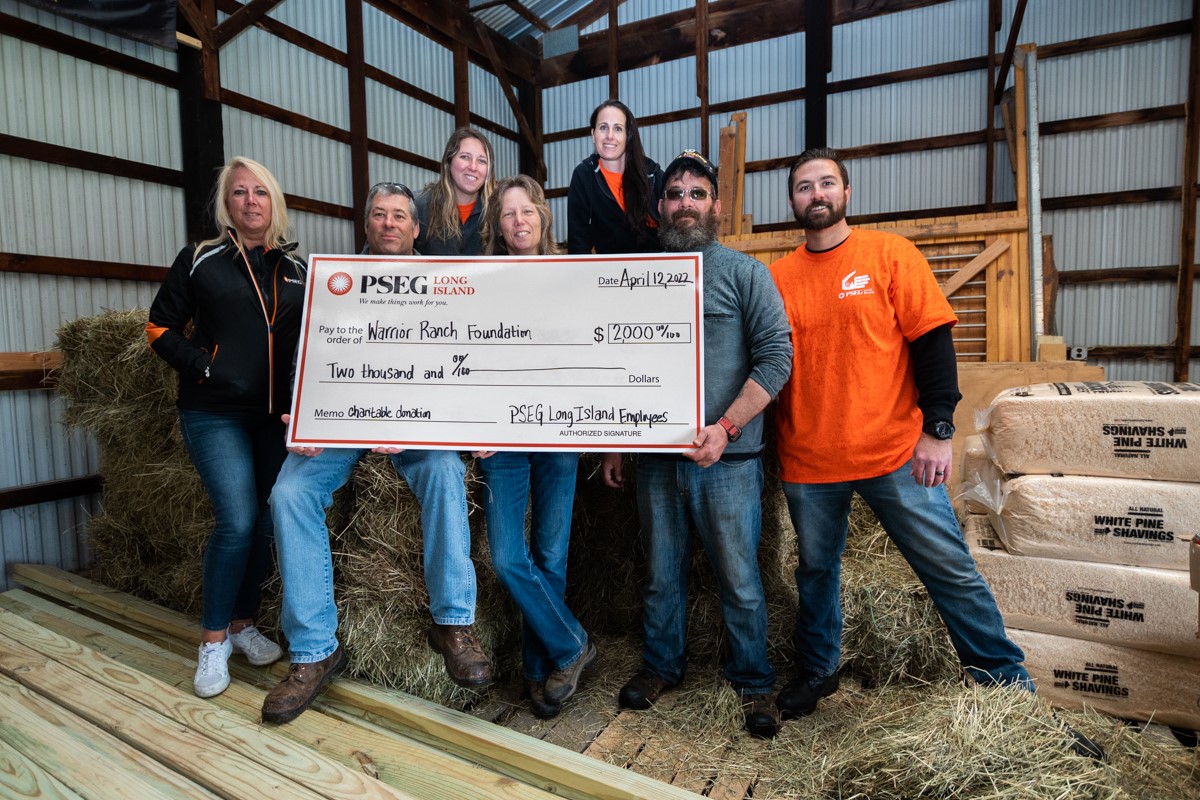 Pictured (l –r): PSEG Long Island employees Debra Gilmartin, Rich Rohman and Jessica Gilmartin, Warrior Ranch Foundation President Eileen Shanahan, and PSEG Long Island employees Nora Atcosta, Tom Gross and James Raimondi. 	
